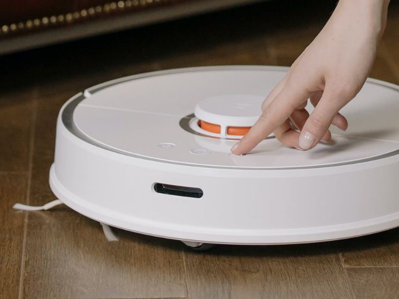 white-and-orange-plastic-container