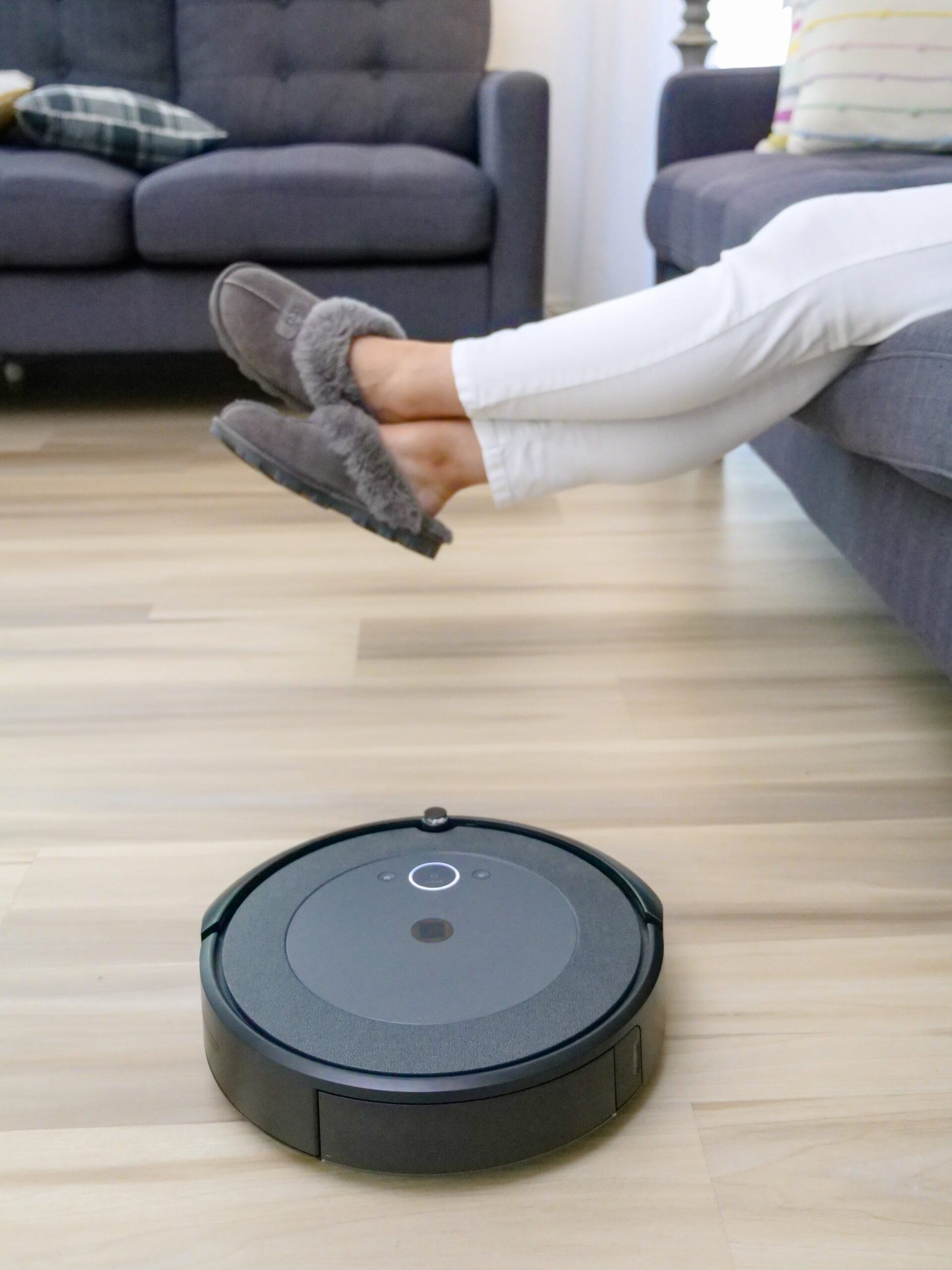 black vacuum cleaner on the hardwood floor